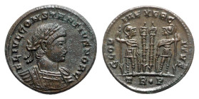 Constantine II (Caesar, 316-337). Æ Follis (18mm, 2.64g, 12h). Treveri, 332-3. Laureate and cuirassed bust r. R/ Two signa between two soldiers, each ...