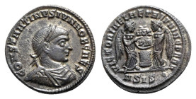 Constantine II (Caesar, 316-337). Æ Follis (19.5mm, 3.22g, 12h). Siscia, AD 319. Laureate, draped and cuirassed bust r. R/ Two Victories standing faci...