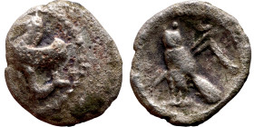 PHOENICIA: Tyre (4th century) Ar Obol Obverse: Hippocamp left; waves and dolphin below. Reverse: Owl standing right, head facing; crook and flail diag...