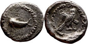 PHOENICIA: Tyre (5 - 4th century) Ar Obol Obverse: Dolphin leaping to left within guilloche border. Rev. Owl standing to right, head facing, with croo...
