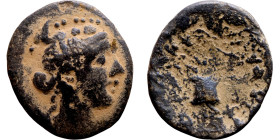 Hellenistic period coin (4-1 century BC) Bronze coin. Obverse: Bust of Apollo. Reverse: Unredable

20mm 4.75g

Artificial sand patina