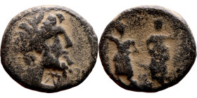 Ptolemaios (Tetrarch of Chalkis: 1 th century BC) bronze coin. Obverse: Laureate head of Zeus right. Reverse: ΠTOΛEMAIOY TETΡAΡXOY KAI AΡXI IEΡ, The D...