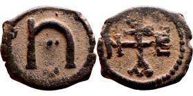 Tiberius II Constantine. (578-582) Pentanummium Obv:Cross monogram Rev: Large U 

14mm 1.64g

Artificial sand patina