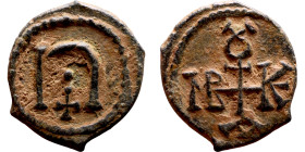 Tiberius II Constantine. (578-582) Pentanummium Obv:Cross monogram Rev: Large U 

13mm 1.52g