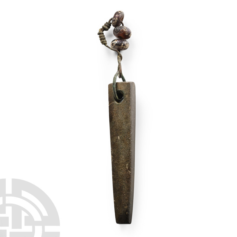 Viking Whetstone Pendant

9th-11th century A.D. Square-section bar of tapering...