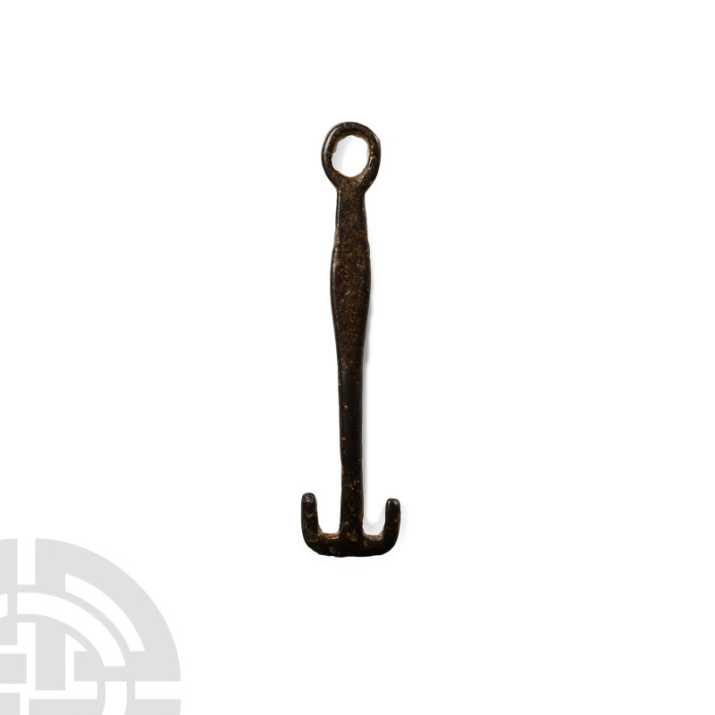 Anglo-Saxon Bronze Girdle Hanger Pendant

Late 5th-early 6th century A.D. A T-...