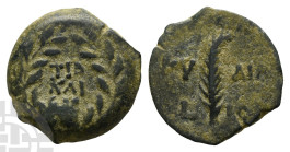 Judaea. Procurators, Valerius Gratus AE Prutah. 15-26 CE. Jerusalem mint. In the names of Tiberius and Julia Augusta (Livia). Dated RY 11 of Tiberius ...