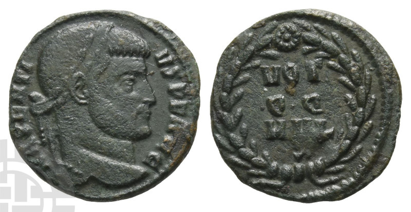Maxentius AE Quarter Nummus. AD 307-312. Rome mint; struck AD 310-312. 

Maxen...
