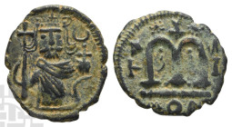 Pre-reform issues. Umayyad Caliphate AE Fals Circa AD 660-680. Pseudo-Damascus mint. Imperial standing figure type (Type VI).