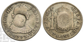 Reproduction of George III Countermarked AR Two Reales of Charles III. 20th century AD.