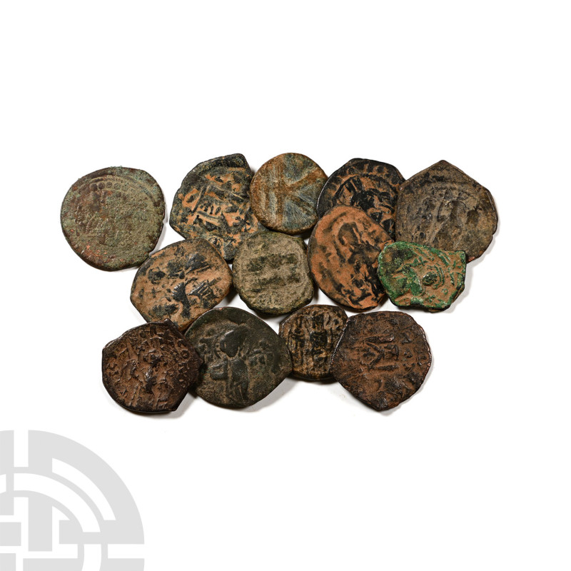 Group of Thirteen [13] Byzantine AE Coins. 6th-9th century AD. 

Group of Thir...
