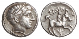 Tetróbolo. 359-336 a.C. FILIPO II. REYES DE MACEDONIA. Anv.: Cabeza laureada de Apolo a derecha. Rev.: Jinete al galope a derecha, debajo rama doble. ...