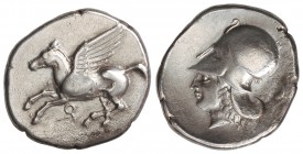 Estátera. 400-338 a.C. CORINTO. Anv.: Pegaso volando a izquierda, debajo ¶. Rev.: Cabeza de Atenea con casco corintio a izquierda, detrás delfín. 8,30...