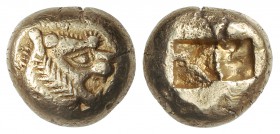 1/3 de Estátera. 650-561 a.C. LYDIA. Anv.: Cabeza de león a derecha con una protuberancia radial en la frente. Rev.: Dos cuadrados incusos. 4,70 grs. ...