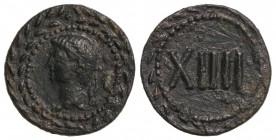 Tesera. Acuñada el 27 a.C. AUGUSTO. Anv.: Cabeza de Augusto a izquierda, alrededor láurea. Rev.: XIIII dentro de láurea. 3,35 grs. AE. (Leves rayitas....