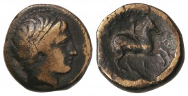 AE 18. 359-336 a.C. FILIPO II. MACEDONIA. Anv.: Cabeza de Apolo a derecha. Rev.: Jinete a derecha, encima (leyenda), debajo letra. 6,26 grs. Se-6696 v...