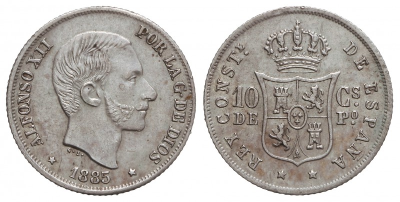 10 Centavos de Peso. 1885. MANILA. (Leves rayitas). Pátina. EBC.