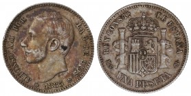 1 Peseta. 1885 (*18-86). M.S.-M. (Leves concreciones). Pátina irregular e irisada de monetario antiguo en reverso. MBC+.