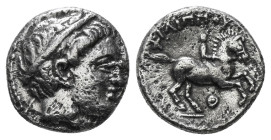 KINGS OF MACEDON. Philip II (359-336 BC). 1/5 Tetradrachm. Amphipolis.
Obv: Diademed head of Apollo right.
Rev: ΦIΛIΠΠOY.
Horseman riding right. 2,39 ...