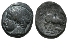 KINGS OF MACEDON. Philip II (359-336 BC). Ae Unit. Uncertain mint in Macedon.
Obv: Diademed head of Apollo left.
Rev: ΦIΛIΠΠOY.
Youth on horseback rig...