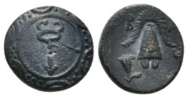 KINGS OF MACEDON. Alexander III 'the Great' (336-323 BC). Ae. Sardes.
Obv: Macedonian shield with kerykeion on boss.
Rev: B - A.
Macedonian helmet. Co...