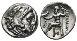 KINGS OF MACEDON. Alexander III 'the Great' (336-323 BC).Drachm.
Obv: Head of Herakles right, wearing lion skin.
Rev: AΛΕΞΑΝΔΡΟY.
Zeus seated left on ...
