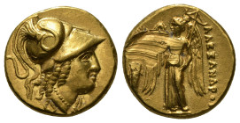 KINGS OF MACEDON. Alexander III 'the Great' (336-323 BC). GOLD Stater. 
Obv: Head of Athena right, wearing crested Corinthian helmet, decorated with s...