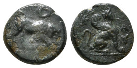 Caria, Kaunos AE Circa 350-300 BC.
Obv: K-A, Sphinx seated right.
Rev: Bull butting right 1,45 g