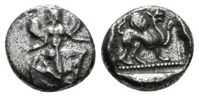 CARIA. Kaunos. Hemidrachm (Circa 490-470 BC).
Obv: Winged female figure in kneeling-running stance right, head left.
Rev: Griffin standing right, rais...
