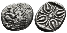 IONIA. Miletos. Obol or Hemihekte (6th-5th centuries BC).
Obv: Forepart of lion right, head left. E to left.
Rev: Stellate floral design, with M repla...