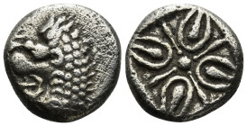 IONIA. Miletos. Obol or Hemihekte (6th-5th centuries BC).
Obv: Forepart of lion right, head left.
Rev: Stellate floral design, with M replacing one of...