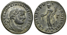 MAXIMIANUS HERCULIUS (286-305).Follis Obv: Laureate head right.Rev: GENIO POPVLI ROMANI
Genius standing left, holding cornucopia and sacrificing with ...