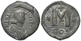 ANASTASIUS I (491-518). Follis. Constantinople.
Obv: D N ANASTASIVS P P AVG.
Diademed, draped and cuirassed bust right.
Rev: Large M; star to left and...