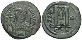 JUSTINIAN I (527-565). Follis. Constantinople. Dated RY 13 (539/40).
Obv: D N IVSTINIANVS P P AVG.
Helmeted and cuirassed bust facing, holding globus ...
