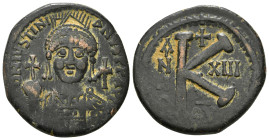 JUSTINIAN I (527-565). Half Follis. Antioch. Dated RY 13 (539/40).
Obv: D N IVSTINIANVS P P AVG.
Helmeted and cuirrased facing bust, holding globus cr...