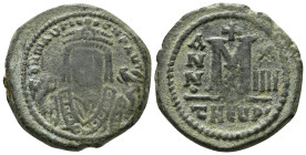 MAURICE TIBERIUS (582-602). Follis. Theoupolis (Antioch). Dated RY 1 (582/3).
Obv: δ ΠTINO ΠTIPPIV.
Crowned bust facing, wearing consular robes and ho...