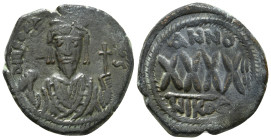 PHOCAS (602-610). Follis. Nicomedia. Dated RY 3 (607/8).
Obv: D N FOCAS EPPAV (S).
Crowned bust facing, wearing consular robes and holding mappa and e...