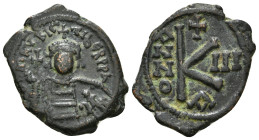 MAURICE TIBERIUS (582-602). Half Follis. .
Obv: D N mAVP C TIb PP AVG.
Crowned and cuirassed bust facing, holding globus cruciger and shield decorated...