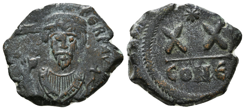 PHOCAS (602-610). Half Follis. Constantinople.
Obv: D N FOCAS PERP AVC.
Crowned ...