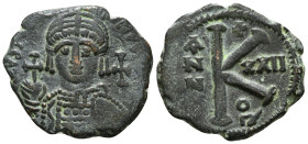 JUSTINIAN I (527-565). Half Follis. Antioch. Dated RY 21 (546/7).
Obv: D N IVSTINIANVS P P AVG.
Helmeted and cuirrased facing bust, holding globus cru...