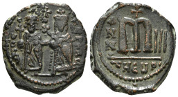 PHOCAS with LEONTIA (602-610). Follis. Theoupolis (Antioch). Dated RY 2 (603/4).
Obv: D N FOCA NЄ PЄ AV.
Phocas, holding globus cruciger, and Leontia,...