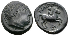 Kings of Macedon, Philip II 359-336 BC. AE (17,3mm, 4,88 g.). Uncertain mint in Macedonia. Diademed head of Apollo to right. Rev. ΦΙΛΙΠΠΟΥ Youth on ho...