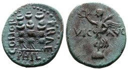 Macedon, Philippi, time of Claudius or Nero 41-68 AD. Pseudo-autonomous issue. AE (19.8 mm, 4,45 g.). VIC AVG Victory standing to left on base, holdin...