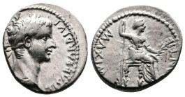 Tiberius, AD 14-37. AR Denarius. (16.4mm, 3,81 g.). Lyons mint. TI CAESAR DIVI AVG AVGVSTVS, laureate head right. Rev. PONTIF MAXIM, Livia, as Pax, ho...