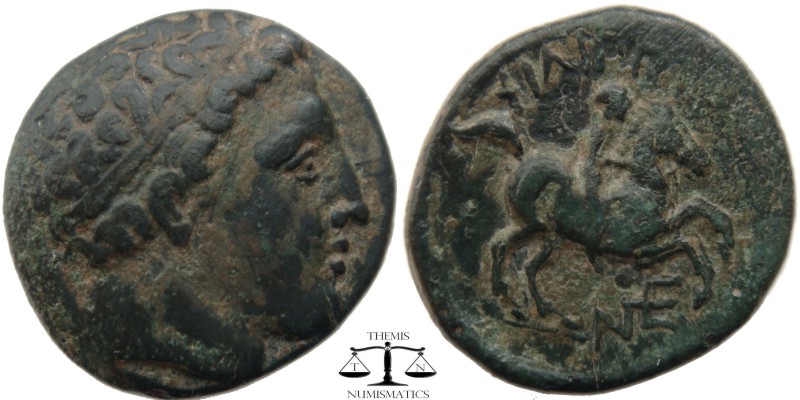 Philip II Kings of Macedonia, AE19 323-317 BC. Head of Apollo right, hair bound ...