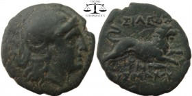 Lysimachos Thrace, AE21 Lysimachia 306-281 BC. Helmeted head of Athena right / BAΣIΛEΩΣ ΛYΣIMAXOY above and beneath lion leaping right, caduceus, N mo...