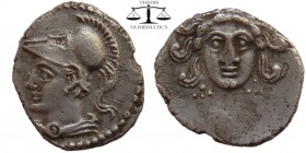 Cilicia, AR Obol Uncertain 4th century BC. Gorgoneion / Helmeted head of Athena left. SNG BN 477. 12 mm., 0,6 g.