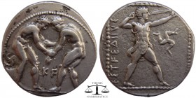 Pamphylia, AR Stater Aspendos ca. 370-330 BC. Two wrestlers grappling, KF between; countermark triskelion / EΣTFEΔIIYΣ, slinger standing right, triske...