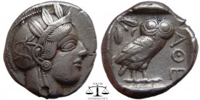 Attica, Athens AR Tetradrachm after 449 BC. Helmeted head of Athena right / AΘE, owl standing right; olive-sprig and crescent above. Bankers mark. SNG...