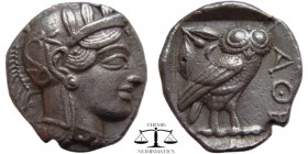 Attica, Athens AR Tetradrachm ca. 454-404 BC. Helmeted head of Athena right / AΘE, owl standing right; olive-sprig and crescent above. SNG Cop 31. 23 ...